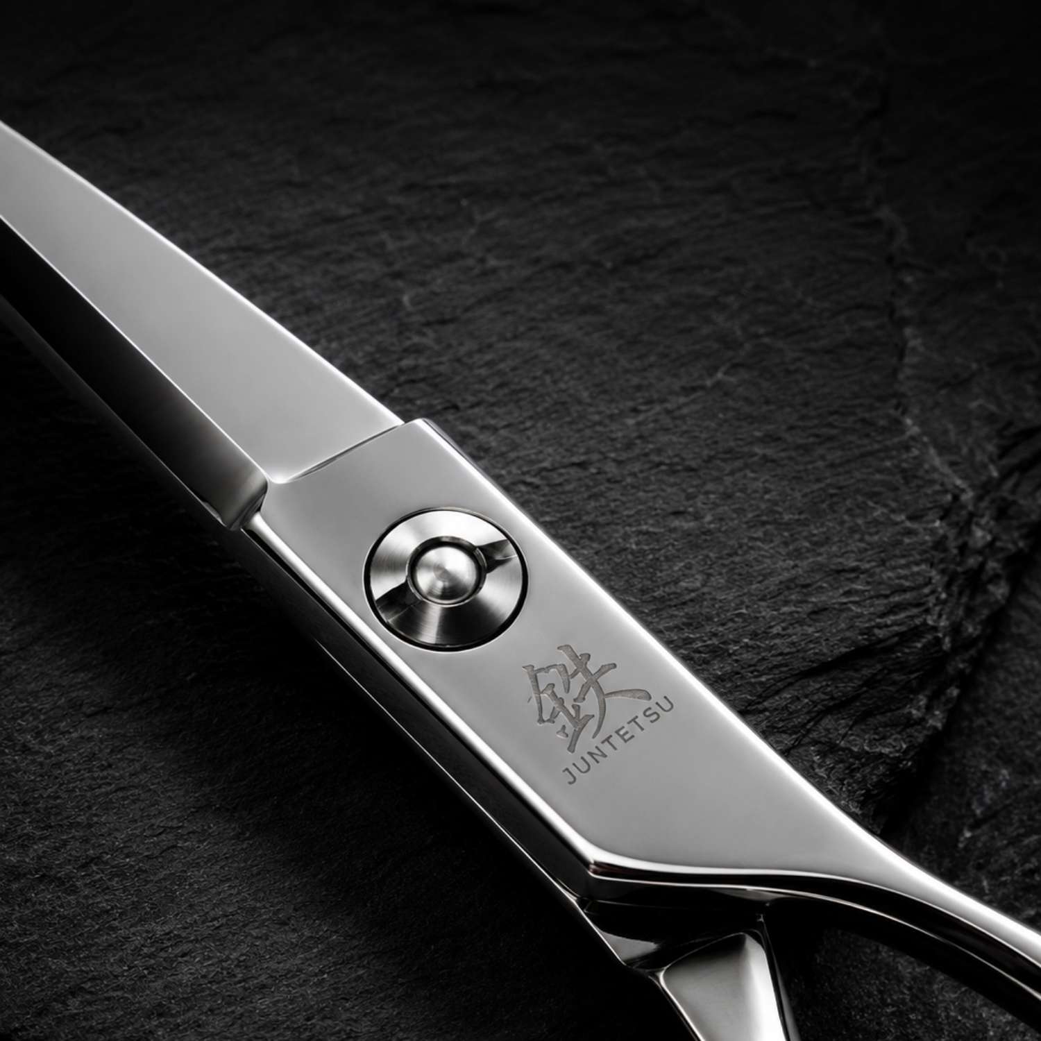 Juntetsu Premium Series: Cobalt Sword Haircutting Scissors - body and pivot close-up