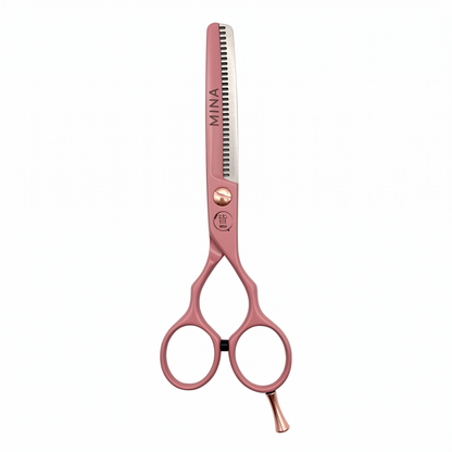 Mina Classic Pastel Pink thinning scissor — close-up of the pastel pink texturizing teeth