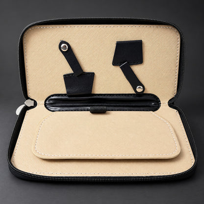 Interior of the Ichiro Shears zip travel case with beige textured lining and press-stud scissor holders